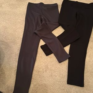 EUC 2 dress leggings. 1 black with front seam stitching and 1 moto gray. Medium
